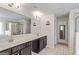 Elegant bathroom with double vanity and large mirror at 916 Dexter Dr, Stockbridge, GA 30281