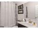 Clean bathroom with shower/tub combo and vanity at 916 Dexter Dr, Stockbridge, GA 30281