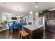 Modern kitchen with dark cabinets and a large island at 916 Dexter Dr, Stockbridge, GA 30281