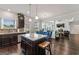 Modern kitchen with dark cabinets and a large island at 916 Dexter Dr, Stockbridge, GA 30281