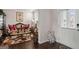 Elegant living room featuring ornate furniture and hardwood floors at 916 Dexter Dr, Stockbridge, GA 30281