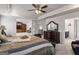 Luxurious main bedroom, featuring sitting area and ensuite bathroom at 916 Dexter Dr, Stockbridge, GA 30281