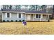 Newly painted house with a yard, ready for new owners at 130 Taunton Rd, Covington, GA 30014