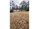 Gray house with white windows and a large yard at 130 Taunton Rd, Covington, GA 30014