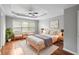 Main bedroom with hardwood floors and plenty of natural light at 5317 Concordia Pl, Mableton, GA 30126