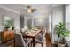 Formal dining room with hardwood floors and a large wooden dining table at 5317 Concordia Pl, Mableton, GA 30126