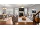 Bright and airy living room with fireplace and hardwood floors at 5317 Concordia Pl, Mableton, GA 30126