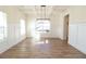 Bright dining room with hardwood floors and wainscoting at 1129 Red Oak Blvd, Loganville, GA 30052