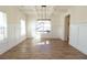 Bright dining room features hardwood floors, recessed lighting, and wainscoting at 1129 Red Oak Blvd, Loganville, GA 30052