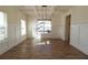 Bright dining room with hardwood floors and wainscoting at 1129 Red Oak Blvd, Loganville, GA 30052