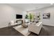 Bright living room features hardwood floors, large windows, and modern decor at 241 Maynard Se Ter # 17, Atlanta, GA 30316