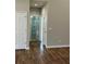 Bathroom view from bedroom features tiled shower and floors at 1250 Adamson Rd, Bowdon, GA 30108