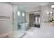 Stylish bathroom with a glass shower, soaking tub, and elegant fixtures creating a relaxing and luxurious space at 2908 Mabry Ne Ln, Brookhaven, GA 30319