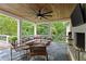 Relaxing covered patio with a fireplace and scenic views at 2908 Mabry Ne Ln, Brookhaven, GA 30319