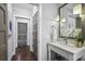 Hallway featuring modern sink, marble countertop and decorative pendant lights at 2908 Mabry Ne Ln, Brookhaven, GA 30319