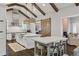 Open-concept kitchen featuring a large island, stainless steel appliances, and a view of the breakfast area at 2908 Mabry Ne Ln, Brookhaven, GA 30319