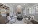 Cozy living room featuring a brick fireplace, large windows, and comfortable seating at 2908 Mabry Ne Ln, Brookhaven, GA 30319