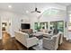 Inviting living room features large windows, neutral decor, and hardwood floors at 2908 Mabry Ne Ln, Brookhaven, GA 30319
