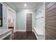 Mudroom features a built-in bench with hooks and a door leading to the exterior at 2908 Mabry Ne Ln, Brookhaven, GA 30319