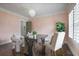 Bright office featuring a modern chandelier, hardwood floors and neutral color palette at 2908 Mabry Ne Ln, Brookhaven, GA 30319