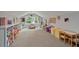 Playroom has neutral walls and carpet, a large window, and plenty of room to play at 2908 Mabry Ne Ln, Brookhaven, GA 30319