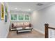 This is a cozy sitting area with natural light from the multiple windows at 2908 Mabry Ne Ln, Brookhaven, GA 30319