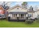 Charming craftsman home with front porch and well-manicured lawn at 684 S Elizabeth Nw Pl, Atlanta, GA 30318