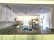 Modern kitchen with granite countertops, stainless steel appliances and Herringbone backsplash at 2924 Sylvan Rd, East Point, GA 30344