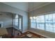 Bright dining area with hardwood floors and access to patio at 153 Lakeshore Ct, Mcdonough, GA 30252