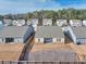 Aerial view of fenced backyards, offering private outdoor space in a peaceful residential neighborhood setting at 4444 Kendrick Cir, Loganville, GA 30052