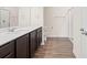 Modern bathroom featuring dark cabinetry, a white countertop, and a stand-up shower at 4444 Kendrick Cir, Loganville, GA 30052