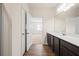 Bathroom featuring dark cabinetry with white countertops at 4444 Kendrick Cir, Loganville, GA 30052