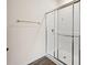 Shower stall featuring sliding glass door and a chrome shower head at 4444 Kendrick Cir, Loganville, GA 30052