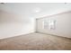 Bright, spacious bedroom featuring neutral walls, plush carpet, and natural light from two windows at 4444 Kendrick Cir, Loganville, GA 30052