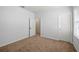 Bedroom featuring neutral walls and carpet floors at 4444 Kendrick Cir, Loganville, GA 30052