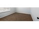 Bedroom featuring carpeted floor, a window and neutral-colored walls at 4444 Kendrick Cir, Loganville, GA 30052