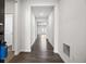 Inviting entry hallway with wood-look flooring, leading to the main living area at 4444 Kendrick Cir, Loganville, GA 30052