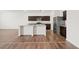 Modern kitchen featuring granite countertops, stainless steel appliances, and a large center island at 4444 Kendrick Cir, Loganville, GA 30052