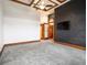 Spacious bedroom with grey carpet, wood trim, and a modern ceiling fan at 3334 Peachtree Ne Rd # 1707, Atlanta, GA 30326
