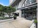 Building entrance with landscaped grounds at 3334 Peachtree Ne Rd # 1707, Atlanta, GA 30326