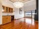 Open concept dining area with hardwood floors and bar at 3334 Peachtree Ne Rd # 1707, Atlanta, GA 30326