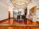 Elegant dining area with hardwood floors and modern chandelier at 3334 Peachtree Ne Rd # 1707, Atlanta, GA 30326