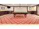 Game room with pool table and patterned carpet at 3334 Peachtree Ne Rd # 1707, Atlanta, GA 30326