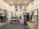 Bright community gym features high ceilings, an assortment of fitness equipment, and large picture windows at 3334 Peachtree Ne Rd # 1707, Atlanta, GA 30326