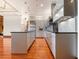 Bright kitchen with stainless steel appliances, granite countertops, and a large center island at 3334 Peachtree Ne Rd # 1707, Atlanta, GA 30326