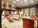 Luxurious library with comfortable seating and built-in bookshelves at 3334 Peachtree Ne Rd # 1707, Atlanta, GA 30326