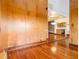 Spacious living area with hardwood floors and wood wall features at 3334 Peachtree Ne Rd # 1707, Atlanta, GA 30326