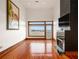 Spacious living room featuring hardwood floors and a fireplace at 3334 Peachtree Ne Rd # 1707, Atlanta, GA 30326