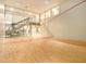 Expansive squash court with glass wall overlooking fitness center at 3334 Peachtree Ne Rd # 1707, Atlanta, GA 30326