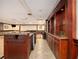 Basement wet bar with granite countertops and wood cabinets at 3334 Peachtree Ne Rd # 1707, Atlanta, GA 30326